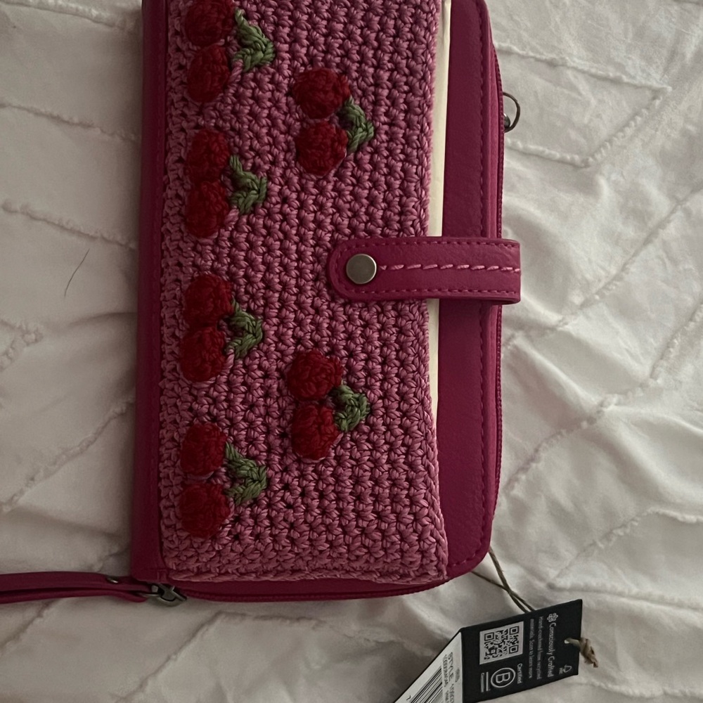 The Sak Fuchsia Crochet Wallet with Cherry Accents